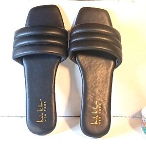 Nicole Miller Women's Solid Black Faux Leather Open Toe Flat Heel Slides…